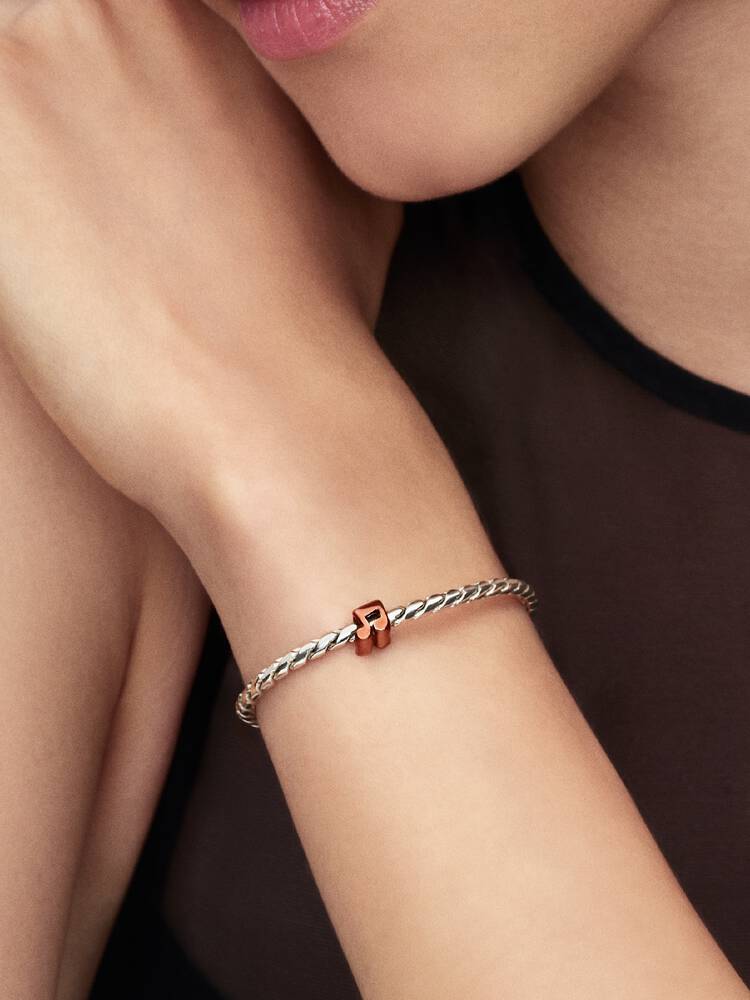 Pandora Mini Charm Nota Musicale effetto metallico arancione