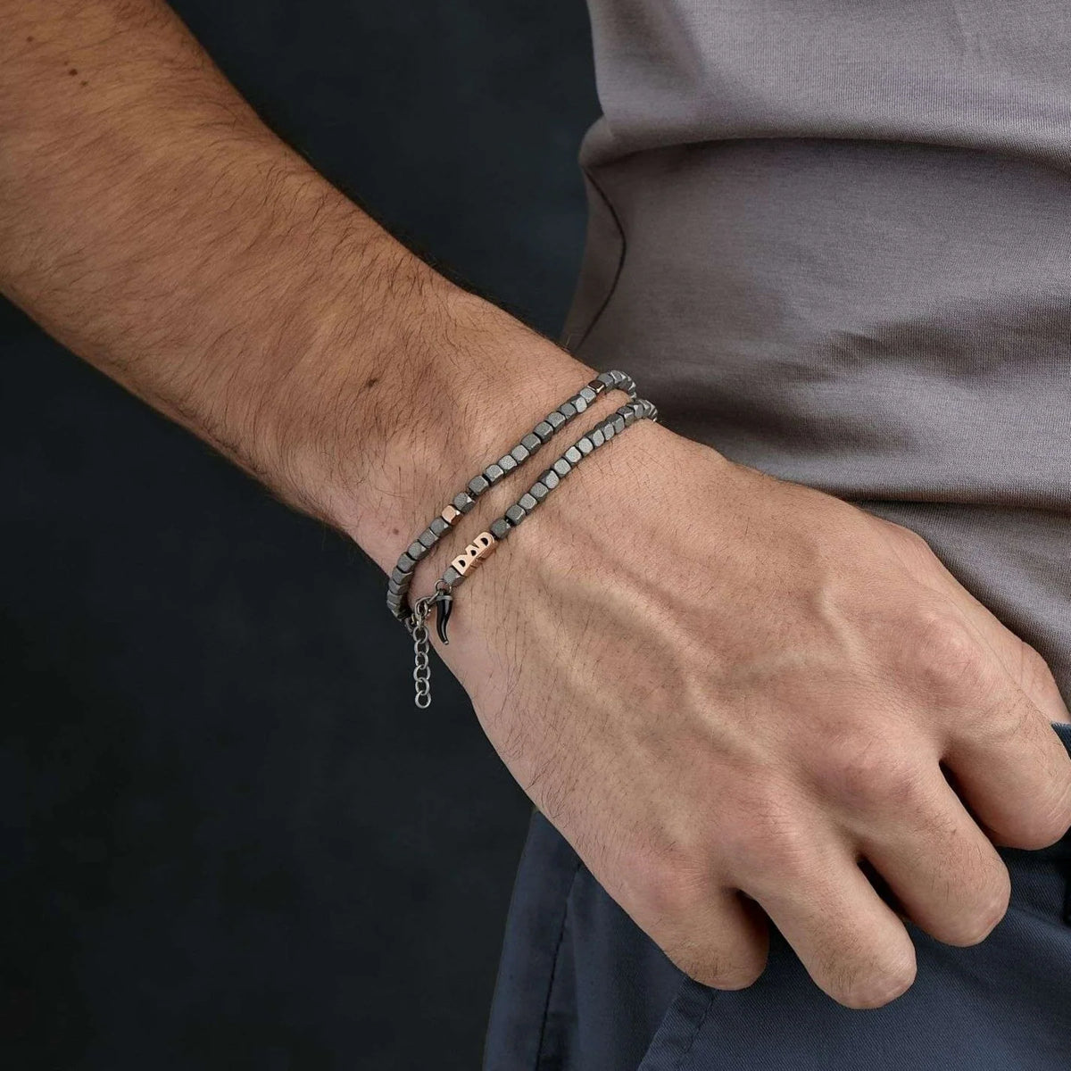 MANO-J - BRACCIALE UOMO CON CUBI IN TITANIO E IN ORO ROSSO 9KT