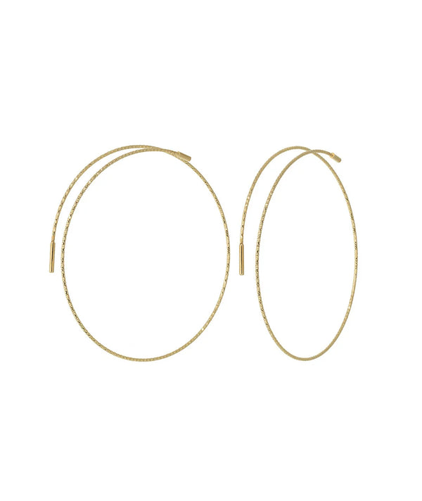 Magic Wire - Orecchini a cerchio in oro giallo