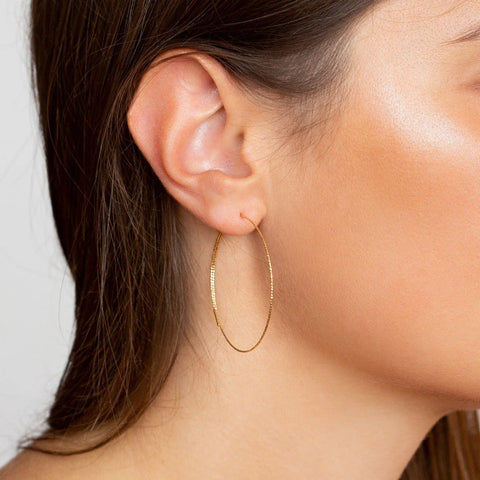 Magic Wire - Orecchini a cerchio in oro giallo