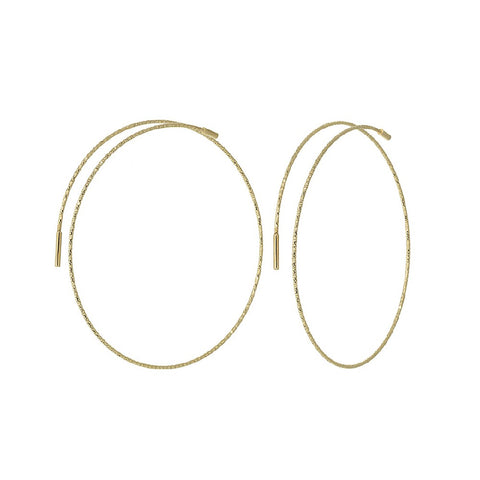 Magic Wire - Orecchini a cerchio in oro giallo